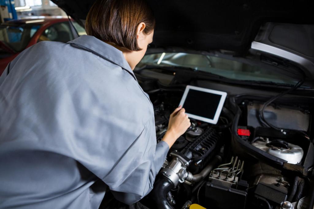 female-mechanic-using-diagnostic-tool.jpg