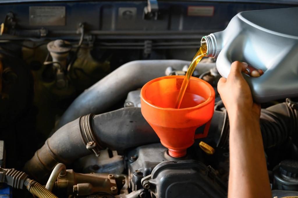 asian-auto-mechanic-working-auto-repair-shop-pour-oil-oil-change-garage-customers-who-repair-cars-change-oil.jpg