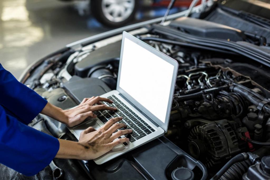 hands-female-mechanic-using-laptop.jpg